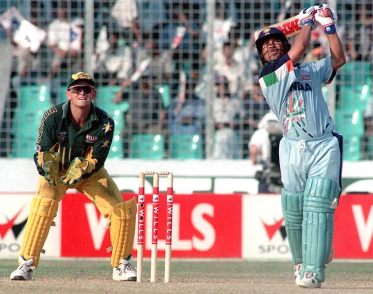 Sachin Tendulkar launches a big one down the ground, India v Australia, 3rd quarterfinal, Wills International Cup, Dhaka, October 28, 1998