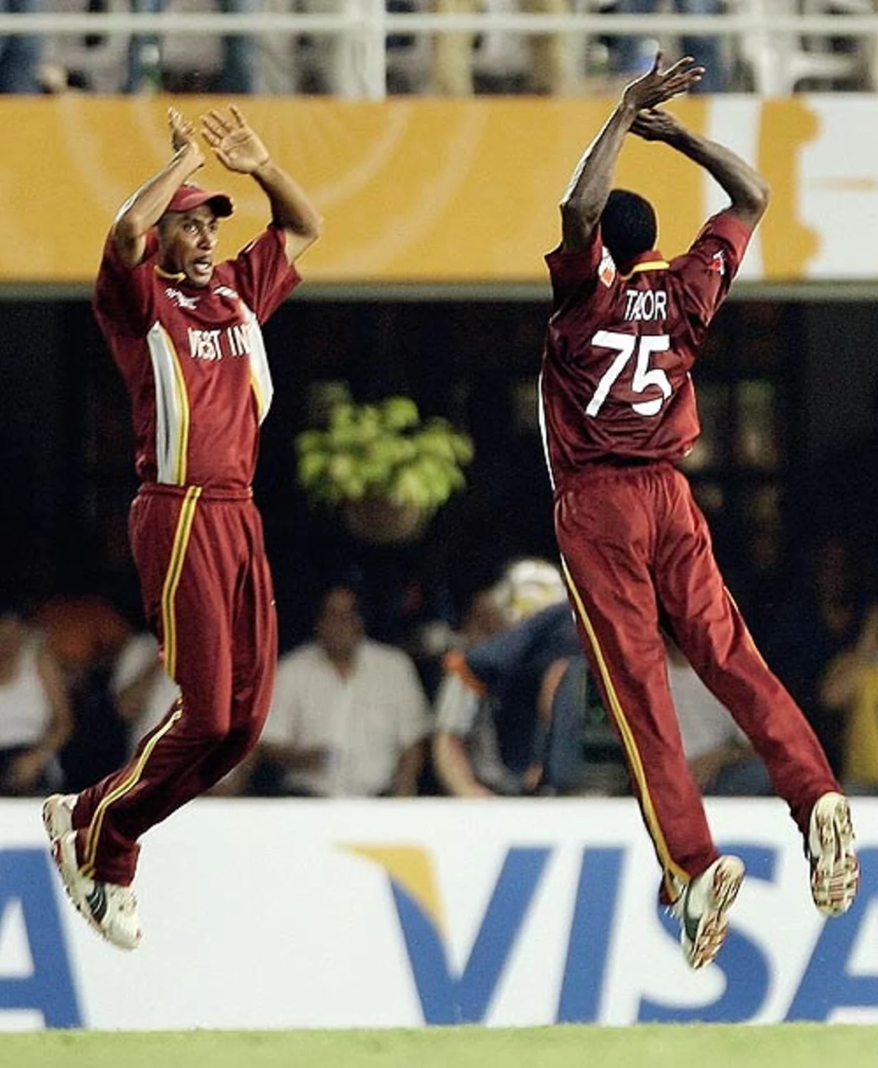 JeromeTaylor and Ian Bradshaw celebrate Ricky Ponting's wicket, West Indies v Australia, Champions Trophy final, Mumbai, November 5, 2006