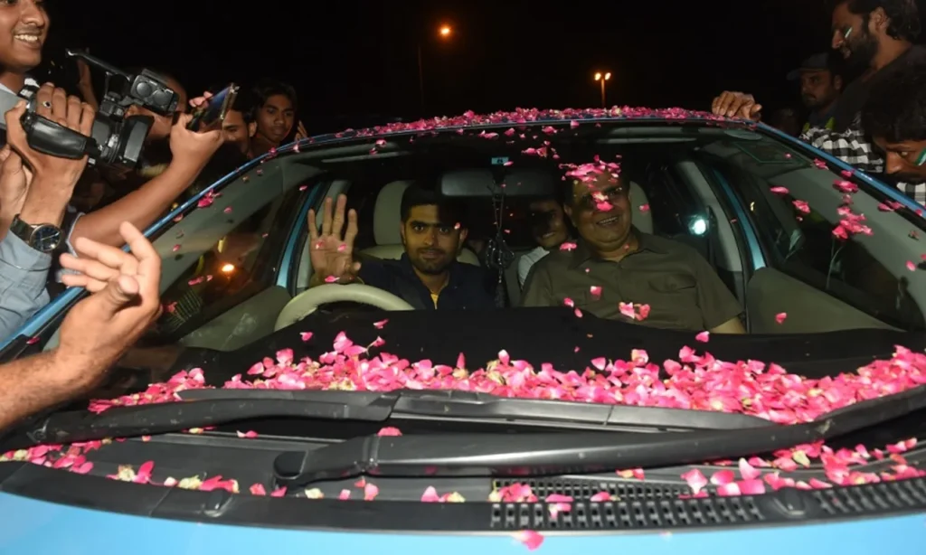 Babar Azam leaves the airport with his car draped in rose petals, Lahore, June 20, 2017