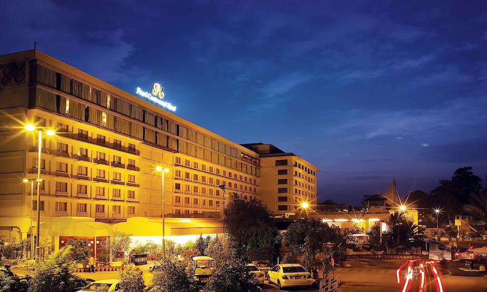 A luxurious hotel lobby, such as Pearl Continental or Avari Lahore.