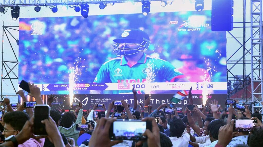 A photo of virat kholi for fan zones with big screens and celebrations during a match