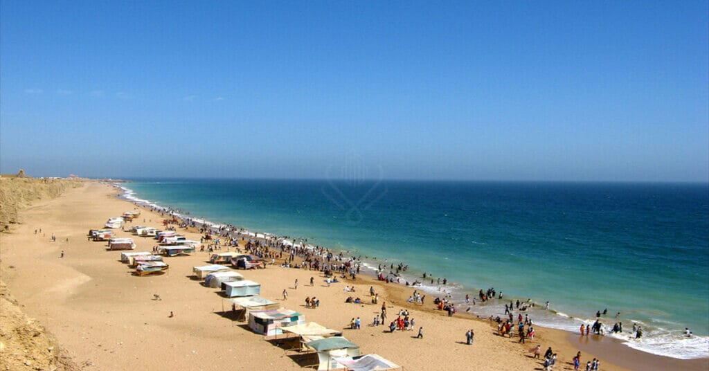 Clifton Beach or Hawksbay for a scenic beach view.